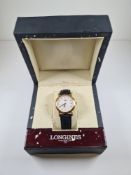 Longines; a boxed 18ct rose gold Longines watch with white dial, Roman numerals and date aperture wi