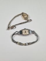 A vintage ladies 14K white gold Hamilton Cocktail watch inset with diamonds, on plated rope design s