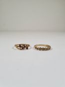 Two 9ct gold rings, one a cross over design garnet set ring the other a band ring set clear stones,