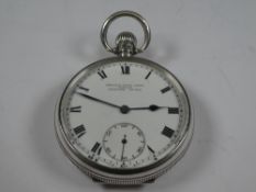 A silver quality pocketwatch by Dent, having engine turned design, central vacant cartouche, and ena