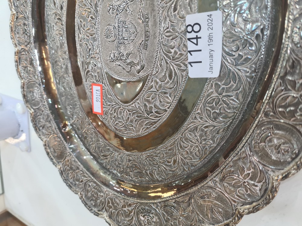 A white metal decorative tray having floral bordered pattern central motif enscribed 'Malaysia' and - Image 3 of 3