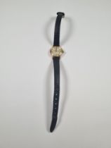 Omega; A ladies gold plated Omega wristwatch with champagne dial and baton markers, Cal. 620, 1965,