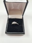 Contemporary 9ct white gold diamond dress ring with 3 graduated square panels each set 9 small round