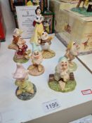 A set of Royal Doulton limited edition Snow White and the 7 Dwarfs No. 1528, all boxed with certific