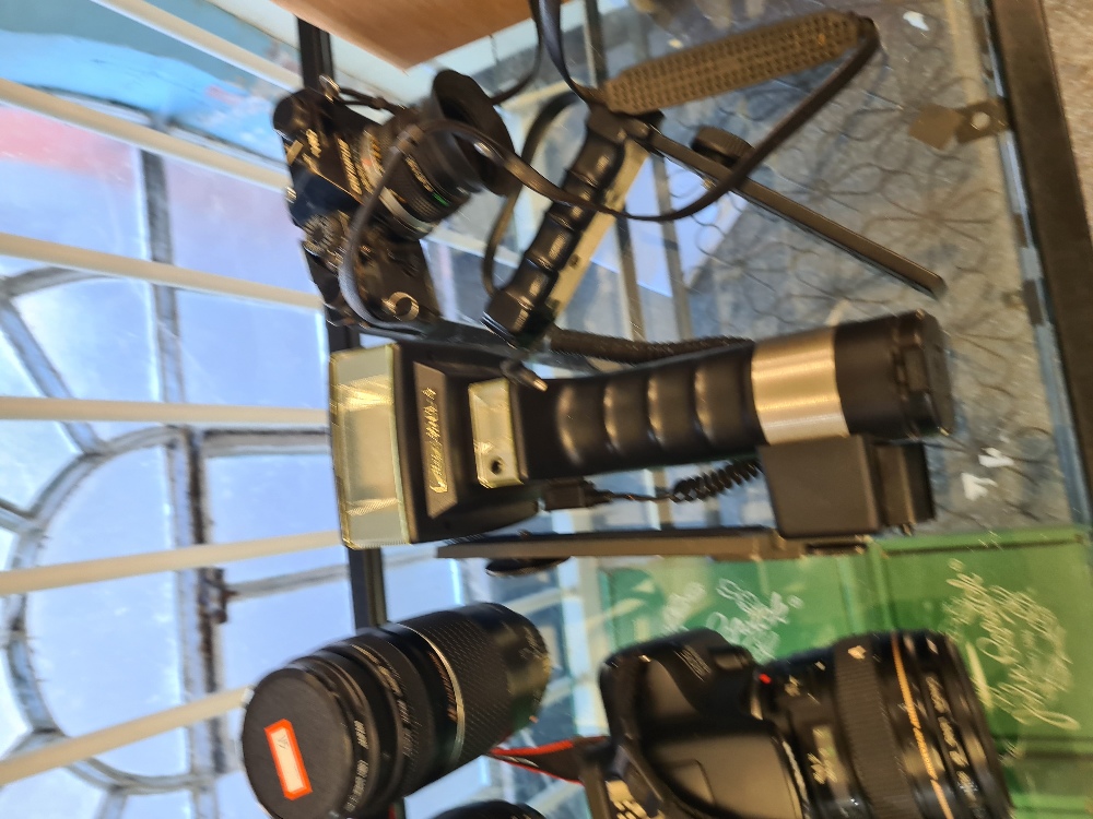 A modern Canon EOS 1300D camera, a similar EIS 1200D example, a quantity of lenses, a Metz 45 CL - 4 - Image 6 of 7
