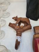 A Bavarian carved bear hook, 18cm