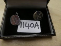Pair of cased silver cufflinks, of circular form, the face hallmarked