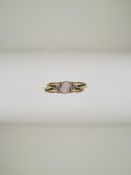 9ct gold dress ring, with oval pale stone, size S, marked 375, Birmingham, 1.87g approx