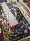 Box of various modern costume jewellery including bead necklaces, large bird of paradise brooch, etc