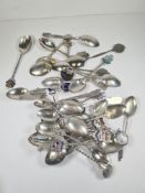 A quantity of silver Souvenir spoons having various hallmarks, destinations and design.  Some foreig