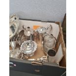 A quantity of silver plate and plated cutlery to include a three piece tea set