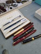 5 old fountain pens, a Parker Duofold pen set and a biro