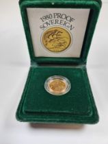 The Royal Mint; A cased Proof Full Sovereign, dated 1980, Elizabeth II & George & the Dragon, encaps