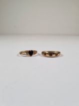 Two 9ct gold dress rings, one with a heart shaped back panel and the other set 3 red stones, size O,