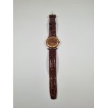 Vintage 9ct gold cased Accurist watch with copper and golden dial Roman numerals and subsidiary seco