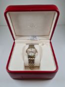 Omega; gent's gold coloured and stainless steel quartz Omega watch. Very nice condition with origin
