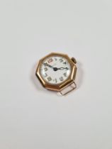 14K gold cased watch head, with circular enamelled numbered dial in octagonal 14K gold cased dial si