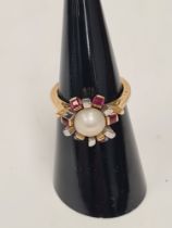 Unusual 18ct and platinum dress ring, with central pearl surrounded square cut rubies, size L, appro