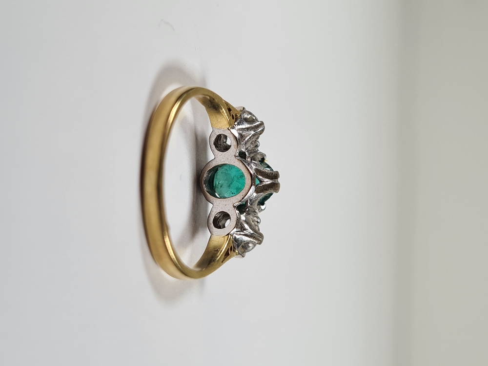 18ct yellow gold emerald and diamond trilogy ring, with central oval mixed cut emerald with a brilli - Image 6 of 12
