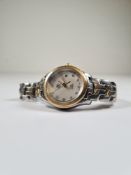 TAG HEUER; a Ladies Tag Heuer bi colour link watch, 27mm case, quartz movement, with circular Mother