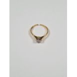 18ct yellow gold solitaire diamond ring in illusion setting, approx 0.10 carat, 18ct gold band marke