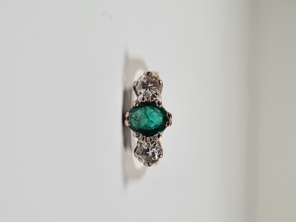 18ct yellow gold emerald and diamond trilogy ring, with central oval mixed cut emerald with a brilli - Image 3 of 12