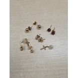 Collection of 9ct and other gold stud earrings,