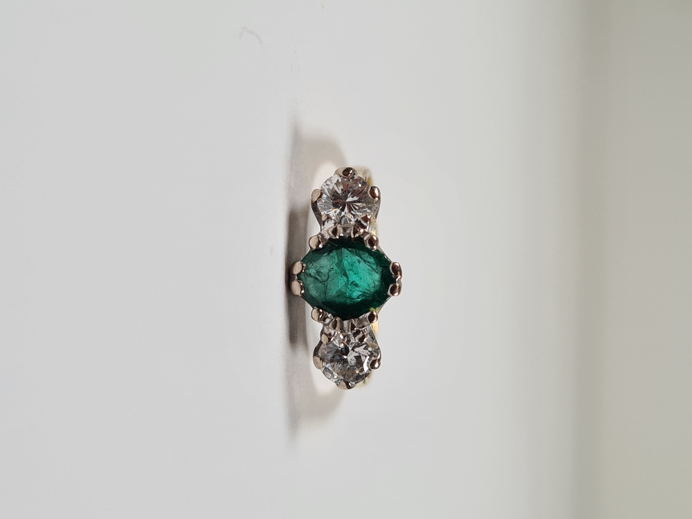 18ct yellow gold emerald and diamond trilogy ring, with central oval mixed cut emerald with a brilli - Image 9 of 12