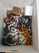 Mixed costume jewellery to include a pair of 9ct yellow gold hoops,. bead necklaces etc