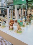 Nine large Royal Doulton Beswick ware Beatrix Potter figures all limited editions, some with certifi