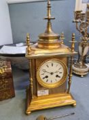 An early 20th Century French style gilt metal mantel clock with turned pillars, 36.5cm