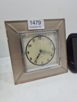 Art Deco easel clock having bevelled glass border and a small travelling leather cased clock