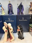 Four Royal Doulton Disney figures to include limited edition of Cruella de Ville, The Queen, The Wit