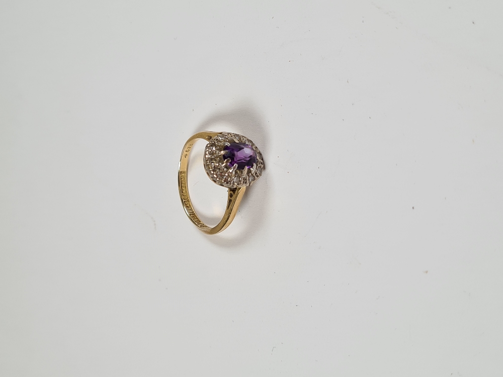 18ct and Platinum Cluster ring, with central oval mixed cut amethyst, surrounded small diamond chips - Image 3 of 6