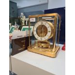 A Jaeger Le Coultre gilt brass Atmos clock, 540 wound 14 jewels (vendor has informed air spring brok