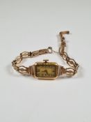 18ct yellow gold cased cocktail watch with rectangular numbered dial, case marked 18, London import