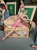 Kevin Francis, a figure of a Lady on Sofa titled La Femme Fatale, number 156/750 with box and certif