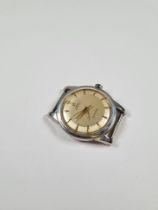 Omega; A Stainless steel gent's Omega Seamaster watch head with champagne dial and gold baton marker