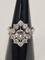 18ct white gold diamond cluster ring, with central round brilliant cut diamond, approx 1 carat, surr