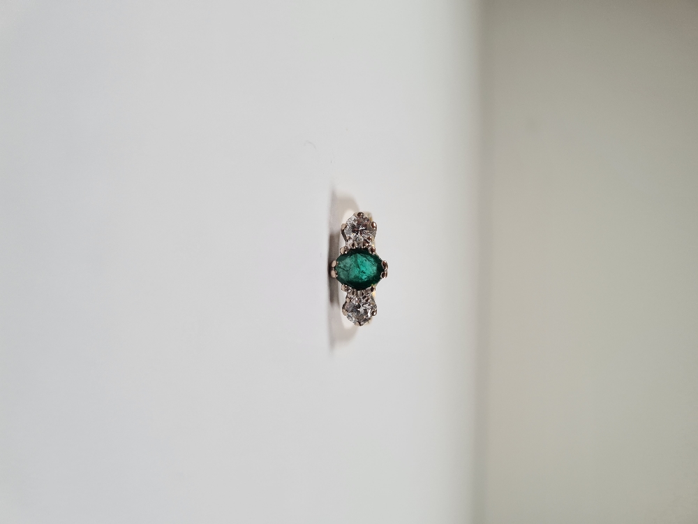 18ct yellow gold emerald and diamond trilogy ring, with central oval mixed cut emerald with a brilli - Image 2 of 12