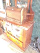 A 2 small over 2 long chest of drawers with mirror and a vintage sewing machine