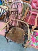 An antique stickback armchair having Elm seat and a Georgian mahogany dining chair