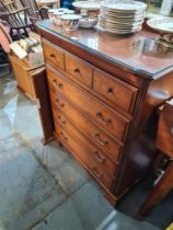 A modern chest having 5 long drawers and a pair of matching bedside cabinets by J E Coyle, and a dre