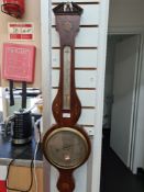A Georgian mahogany inlaid banjo barometer, by M Salmoni, Oxford