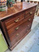 An early 20th century, Walnut chest having 2 short and 3 long drawers