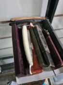 A quantity of old cutthroat razors, some in original holders