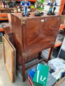 A 19th Century Military campaign desk/cabinet having full front, the interior with shelves and drawe