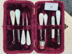 A manicure set, having Mother of Pearl handles