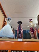 Two Murano Flamenco dancers and one other modern glass paperweight in form of man