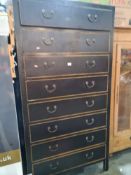 A modern black painted chest of large proportions with 8 drawers, height 195cm
